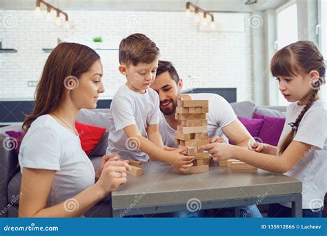 Happy Family Playing Board Games at Home. Stock Photo - Image of play, indoors: 135912866