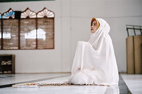 Beautiful Muslim Women Praying In The Mosque Stock Photo - Download ...