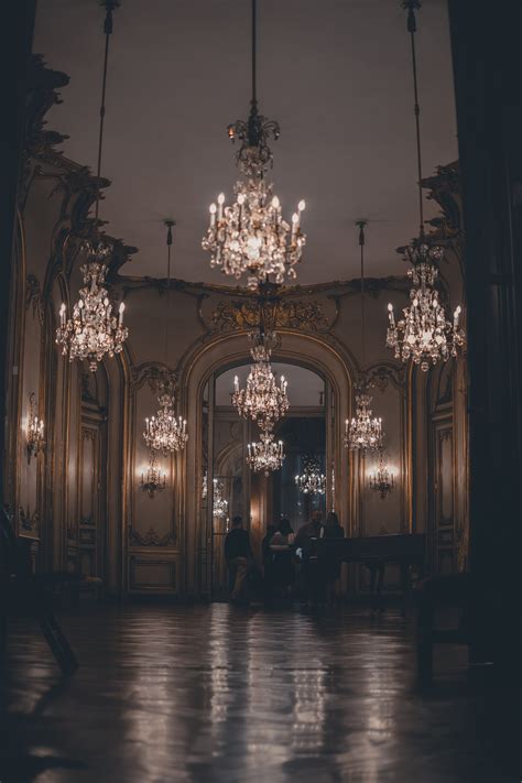 Dark Palace Interior with Chandeliers · Free Stock Photo