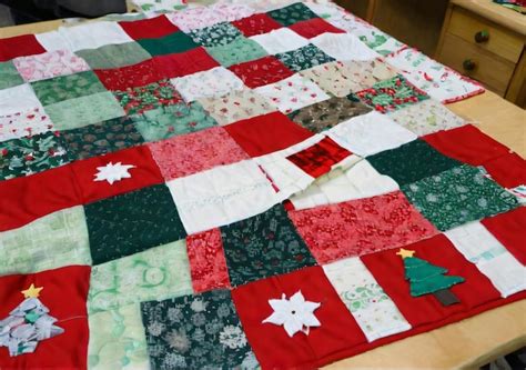 Premium Photo | A ChristmasThemed Patchwork Quilt In Progress On A ...