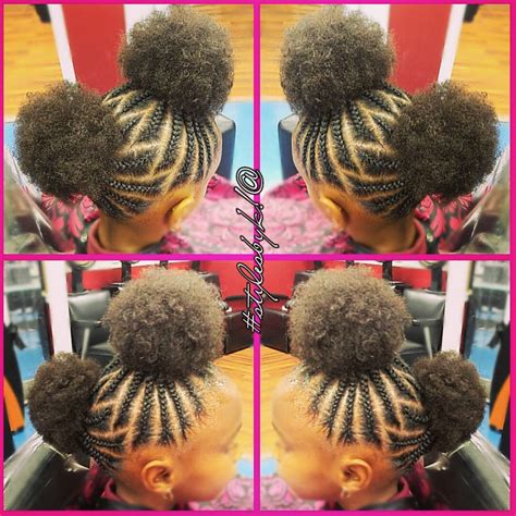 Adorable afro puffs by @kiabia87 Read the article here - http://blackhairinformation.com ...