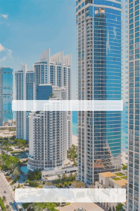 an aerial view of tall buildings and the ocean in miami, with text overlaying it