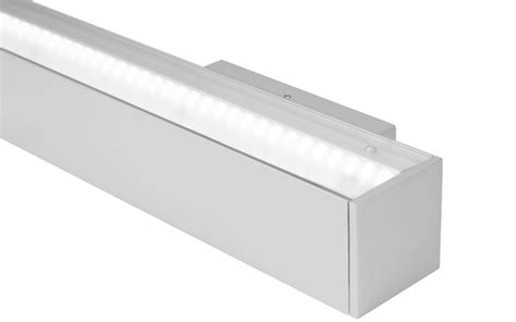 BSS721. MULLION 2-1/4” tall mullion mount asymmetric indirect LED luminaire. by Bartco Lighting