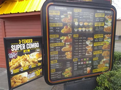 Menu at Golden Chick fast food, Uvalde