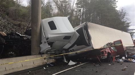 4 people injured after tractor trailer crashes and crushes pickup truck in PG County | WJLA