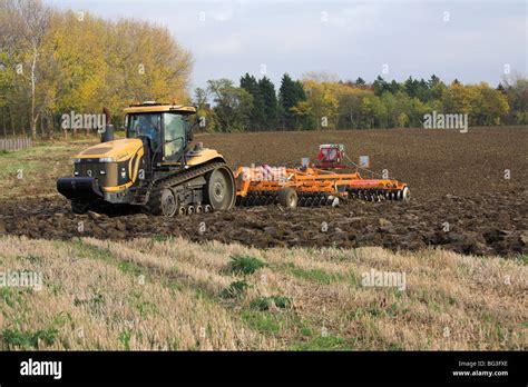 Tilling the soil Stock Photo - Alamy