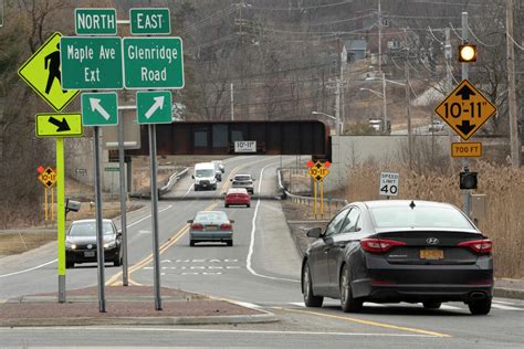 Trucks keep hitting the Glenville Bridge. How would you solve it?