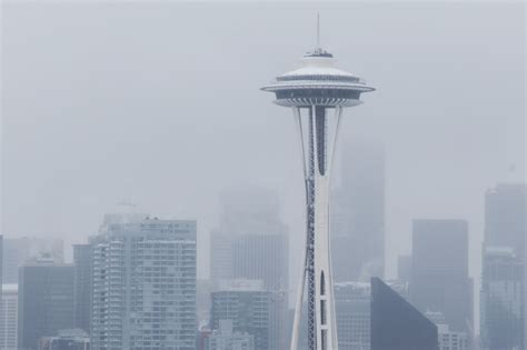 Seattle covered in snow, more falling, closures abound
