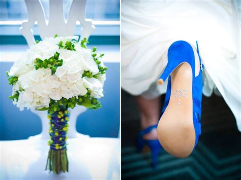 Atlanta bride wears blue bridal heels, clutches white bridal bouquet