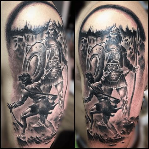 Tattoo uploaded by Torsten Matthes • David and goliath tattoo in black an grey • Tattoodo