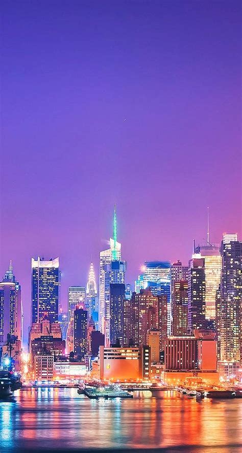Download Colorful Lights In New York Skyline iPhone Wallpaper | Wallpapers.com