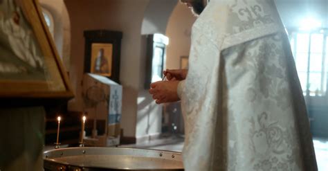 A Priest Preparing Holy Water for a Baptism Ceremony Free Stock Video ...