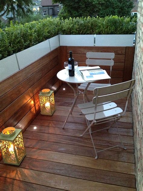 Small roof terrace with planters, lighting & bottle of wine! Backyard ...