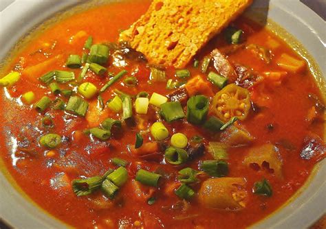 Chicken and okra soup is made with okra, peppers, tomatoes, corn, and ...