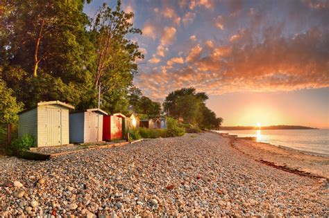 z2413 Bembridge Beach Huts at Sunset