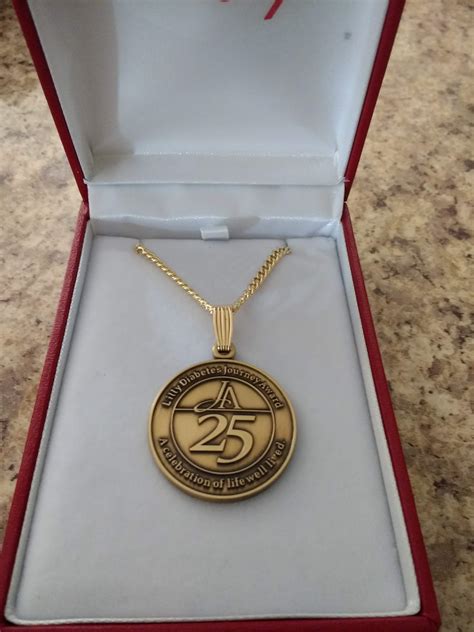 My super fancy engraved 25 year “Lilly Diabetes Journey Award” arrived ...