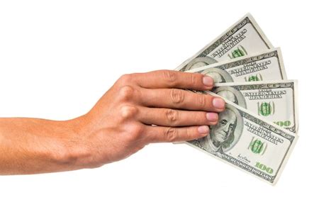 Premium Photo | Male hand holding money cash isolated