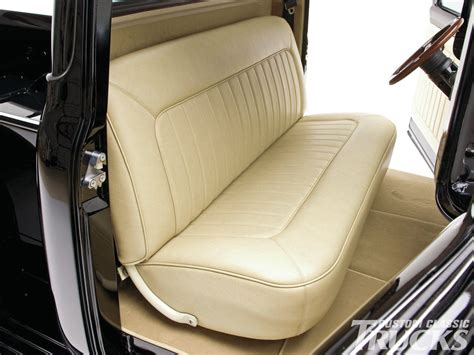 the interior of an old car with leather seats