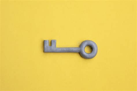 Plasticine Key on Yellow Background. Safety, Protection Concept ...