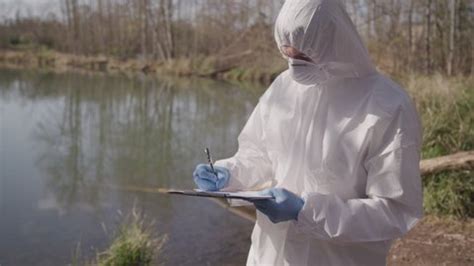 Crime Scene Investigator Hazmat Suit Taking Stock Footage Video (100% ...