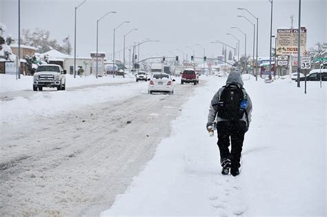 Snow sits atop Kingman, likely breaks 1932 record of 14 inches ...