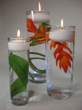 cylinder centerpiece - Google Search | Floating candle centerpieces, Diy wedding decorations ...