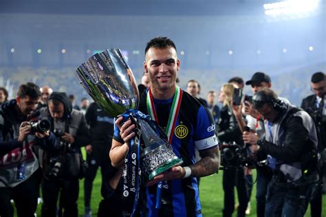 Inter captain Lautaro Martinez celebrates Supercoppa triumph