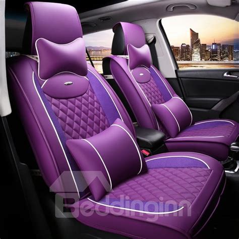 the interior of a car with purple leather and white stitching on the ...