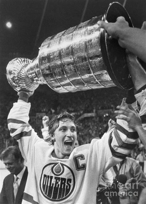 Wayne Gretzky Lifts The Stanley Cup by Bettmann