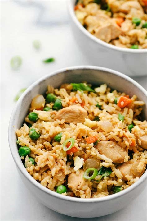 This chicken fried rice has moist and tender chicken with flavorful peas and carrots and long ...