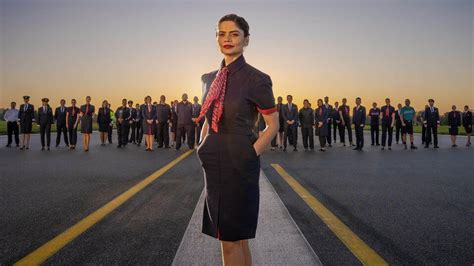 BA unveils jumpsuits in first uniform revamp for 20 years - BBC News