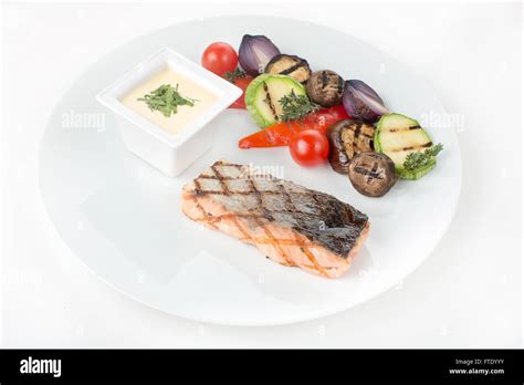 Salmon with grilled vegetables Stock Photo - Alamy