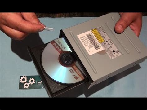 how to manually open a dvd and a cd player with a paper clip without power - YouTube