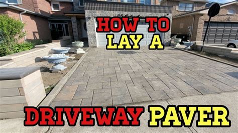 Laying Driveway Paving Stones / Paving Stones Concept Laying Paving Slabs Stock Photo Edit Now ...