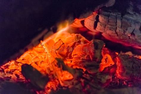 Fire Fireplace Embers Closeup. Glowing Embers in Hot Red Color. Stock ...