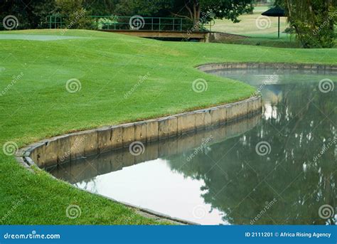 Golf Green And Water Hazard Stock Image - Image: 2111201