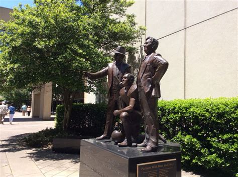 Statue of Bear Bryant and Shug Jordan out front of the Alabama Sports Hall of Fame at the Civic ...