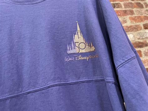 PHOTOS: New Glittery 50th Anniversary Spirit Jersey Arrives at Walt ...