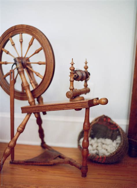 "Antique Wool Spindle Spinning Wheel For Yarn" by Stocksy Contributor "Marta Locklear" - Stocksy