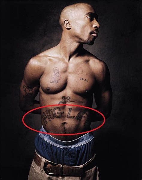 Tupac Shakur’s 21 Tattoos & Their Meanings | Body Art Guru Thug Life Tattoo, Life Tattoos ...