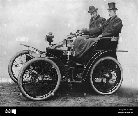 Herbert Austin at tiller of first 4 wheel Wolseley 1899 Stock Photo - Alamy