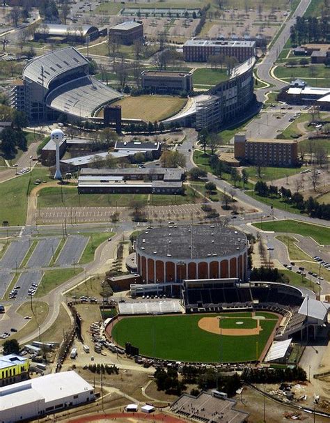 an aerial view of a baseball field and stadium in the distance with ...