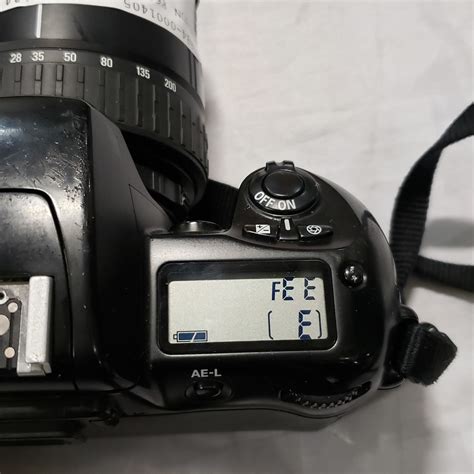 NIKON F60 CAMERA W/ LENS - Big Valley Auction