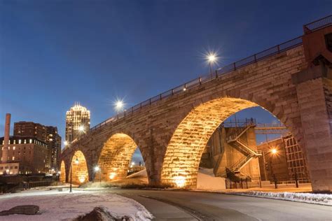 Twilight at the Stone Arch Bridge | Arch bridge, Stone arch, Pedestrian ...