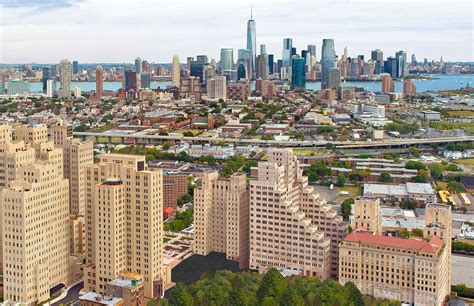 THE OLD JERSEY CITY MEDICAL CENTER WITH DOWNTOWN JERSEY CITY AND THE NEW YORK CITY SKYLINE IN ...