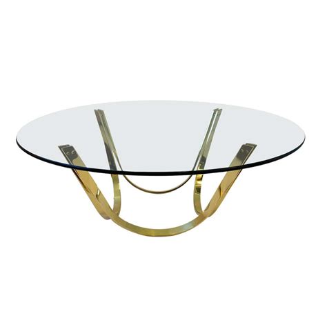 Polished Brass Cocktail Table with Oval Glass Top at 1stDibs