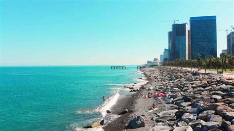 Batumi , Georgia, 2022 - Aerial top down fly over tourist at Sarpi ...