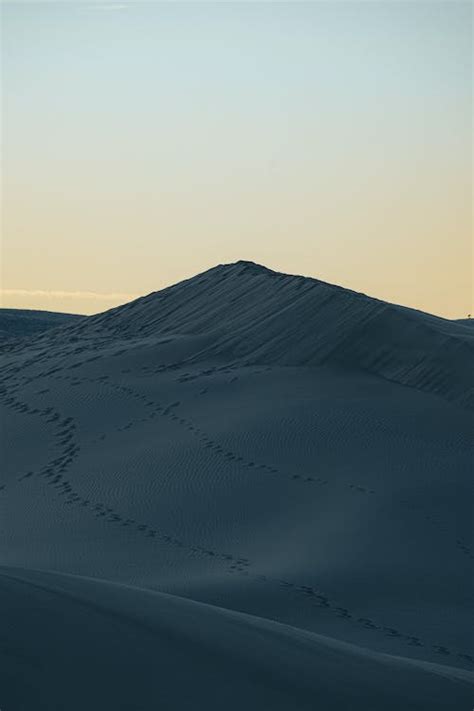 Sand Hills under a Sunset Sky · Free Stock Photo