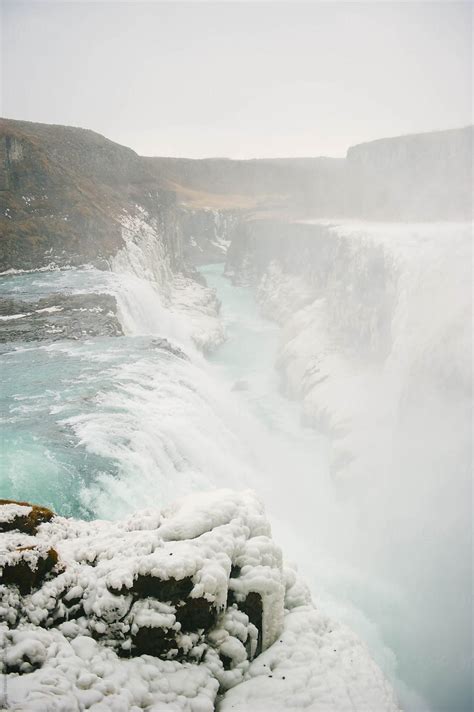 "Gullfoss Waterfall In Winter In Iceland" by Stocksy Contributor "Jess Craven" - Stocksy