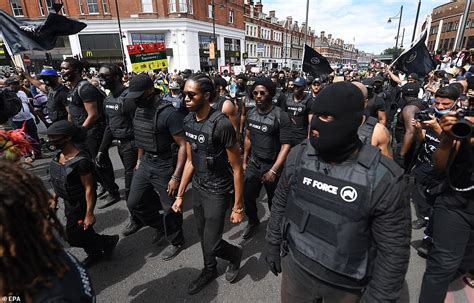 Hundreds of protesters aiming to 'lock down' Brixton march down London streets | Daily Mail Online